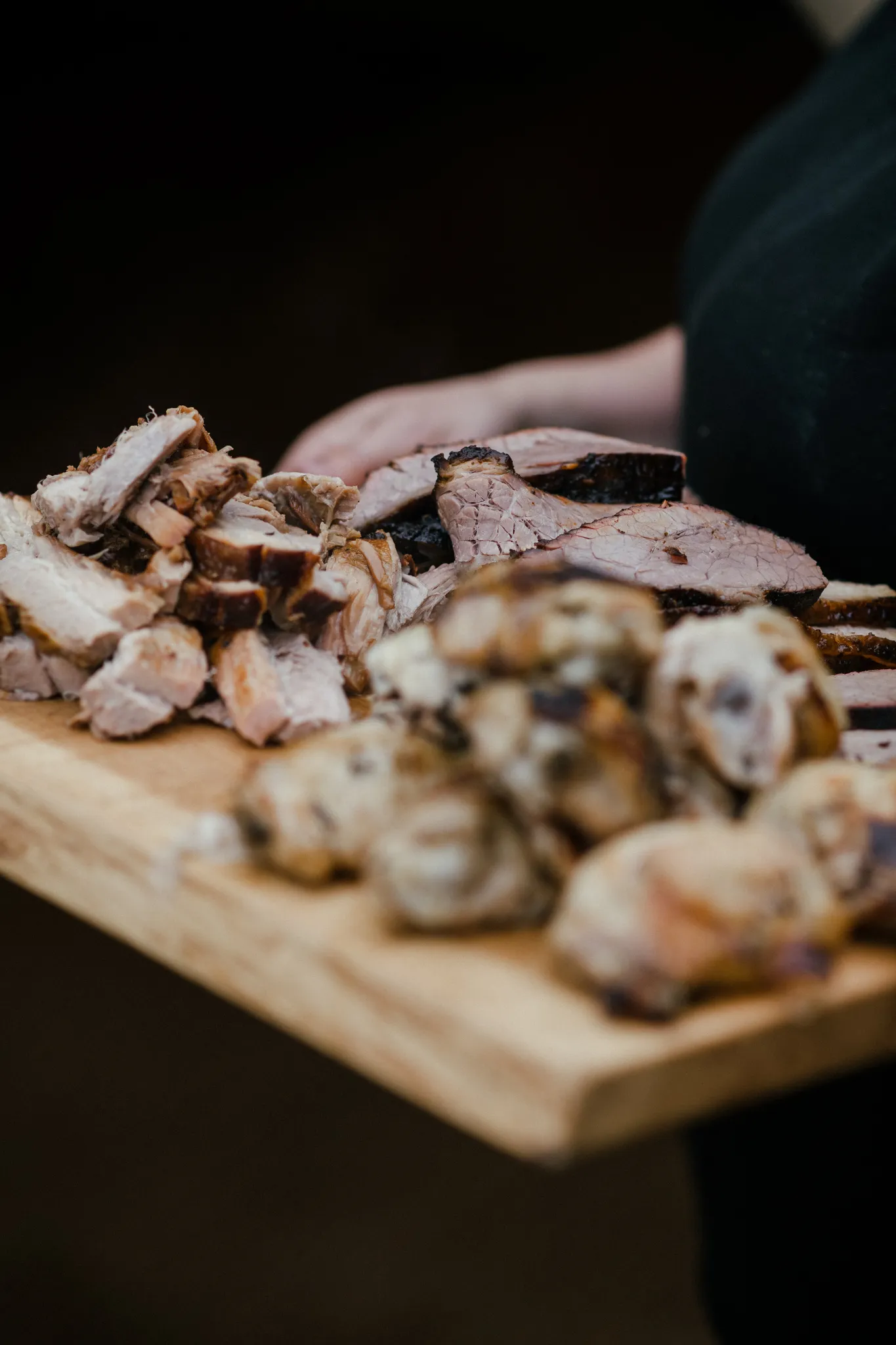Smoked brisket and spatchcock chicken board at a Yorkshire BBQ wedding